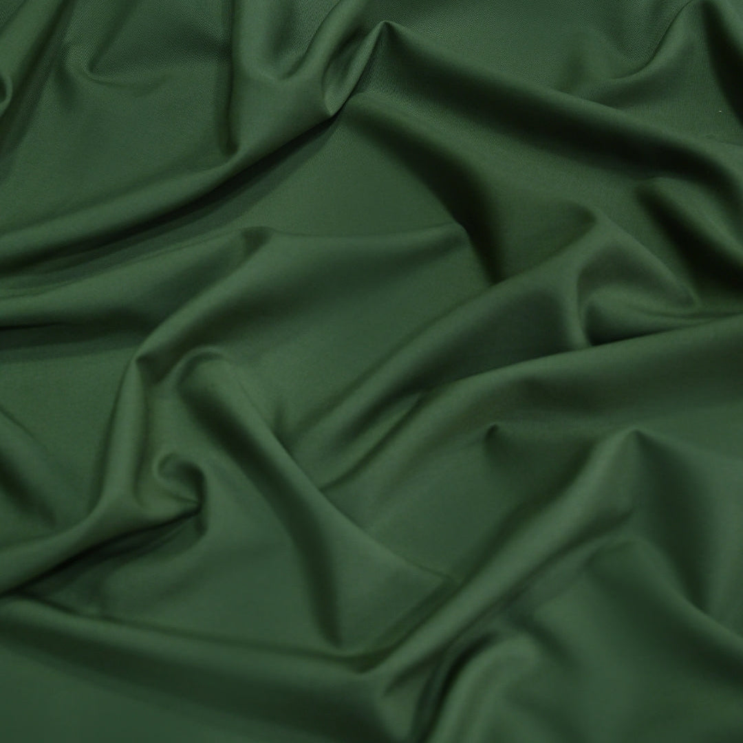 Dark green fabric with folds