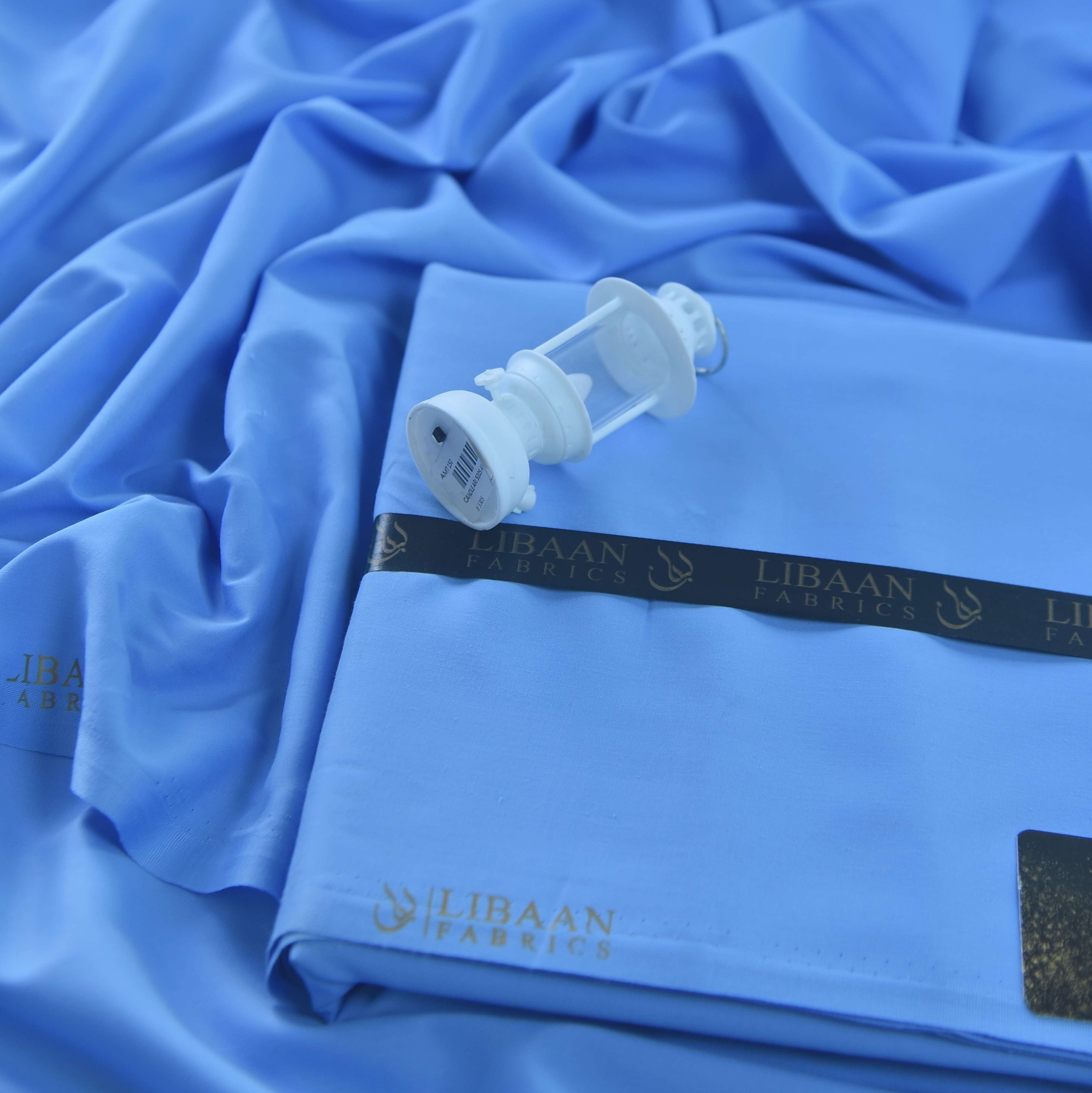 Close-up of blue fabric with a subtle texture