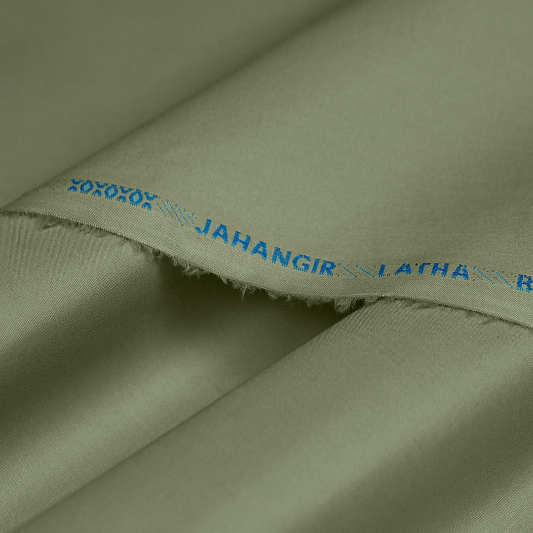 Close-up of green fabric with 'Jahangir Latha' branding.