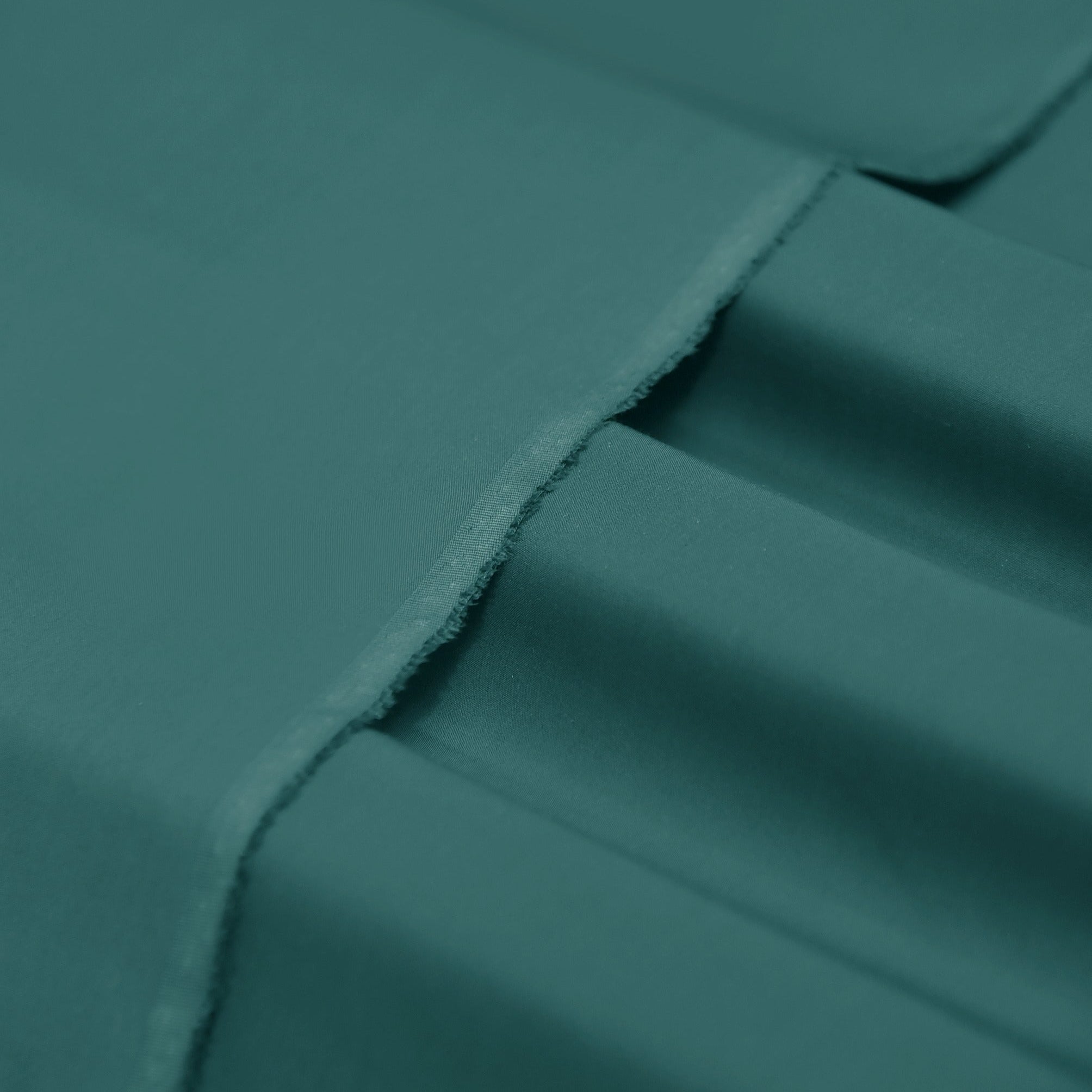 Teal fabric with folds